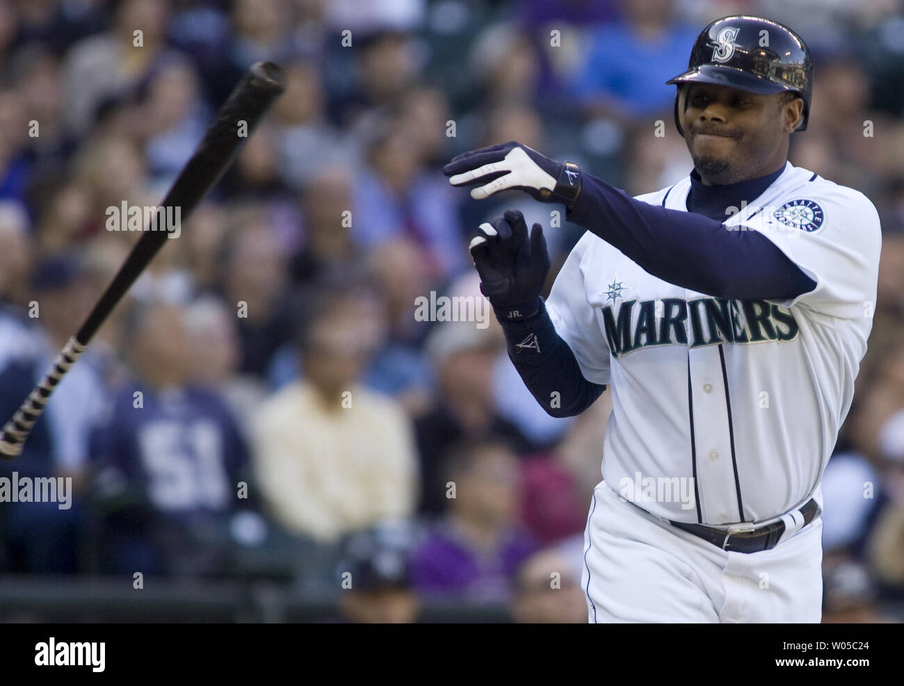 Seattle Mariners' Ken Griffey Jr., tosses his bat after hitting a
