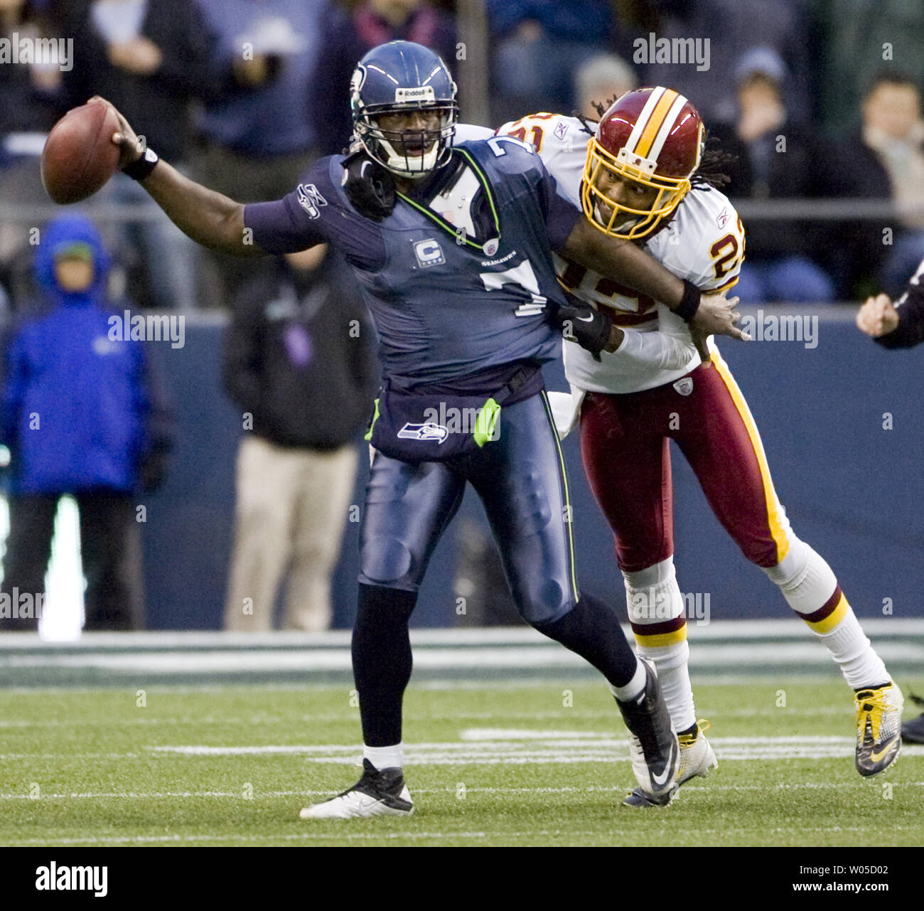 Seattle Seahawks Quarterback Tarvaris Jackson Tries To Scramble