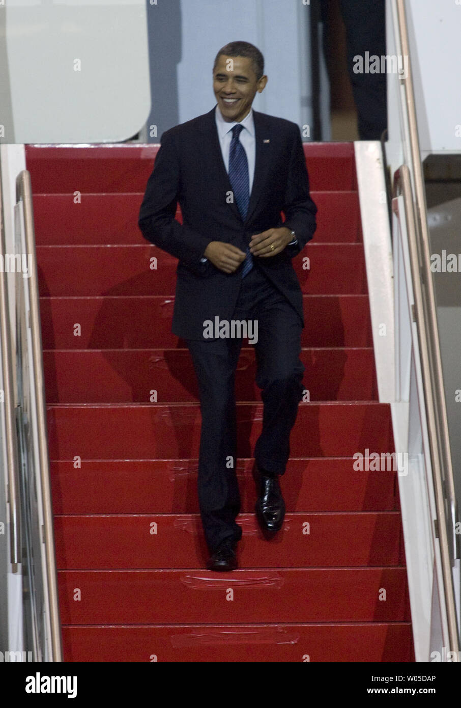 President Barack Obama walks down the stairs of a Boeing 787 Dreamliner to meet with Boeing employees and speak about his blueprint for an economy built to last, based on American domestic manufacturing and promoting American exports,  at the aerospace giant's assembly facility in Everett, Washington on February 17, 2012. Later Obama will be attending two fund raising events for his re-election campaign.   UPI/Jim Bryant Stock Photo
