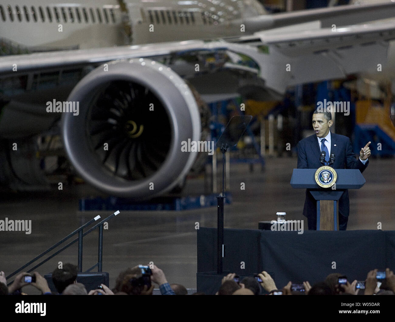 President Barack Obama talks to Boeing employees about his blueprint for an economy built to last, based on American domestic manufacturing and promoting American exports,  at the aerospace giant's assembly facility in Everett, Washington on February 17, 2012. Later Obama will be attending two fund raising events for his re-election campaign.   UPI/Jim Bryant Stock Photo