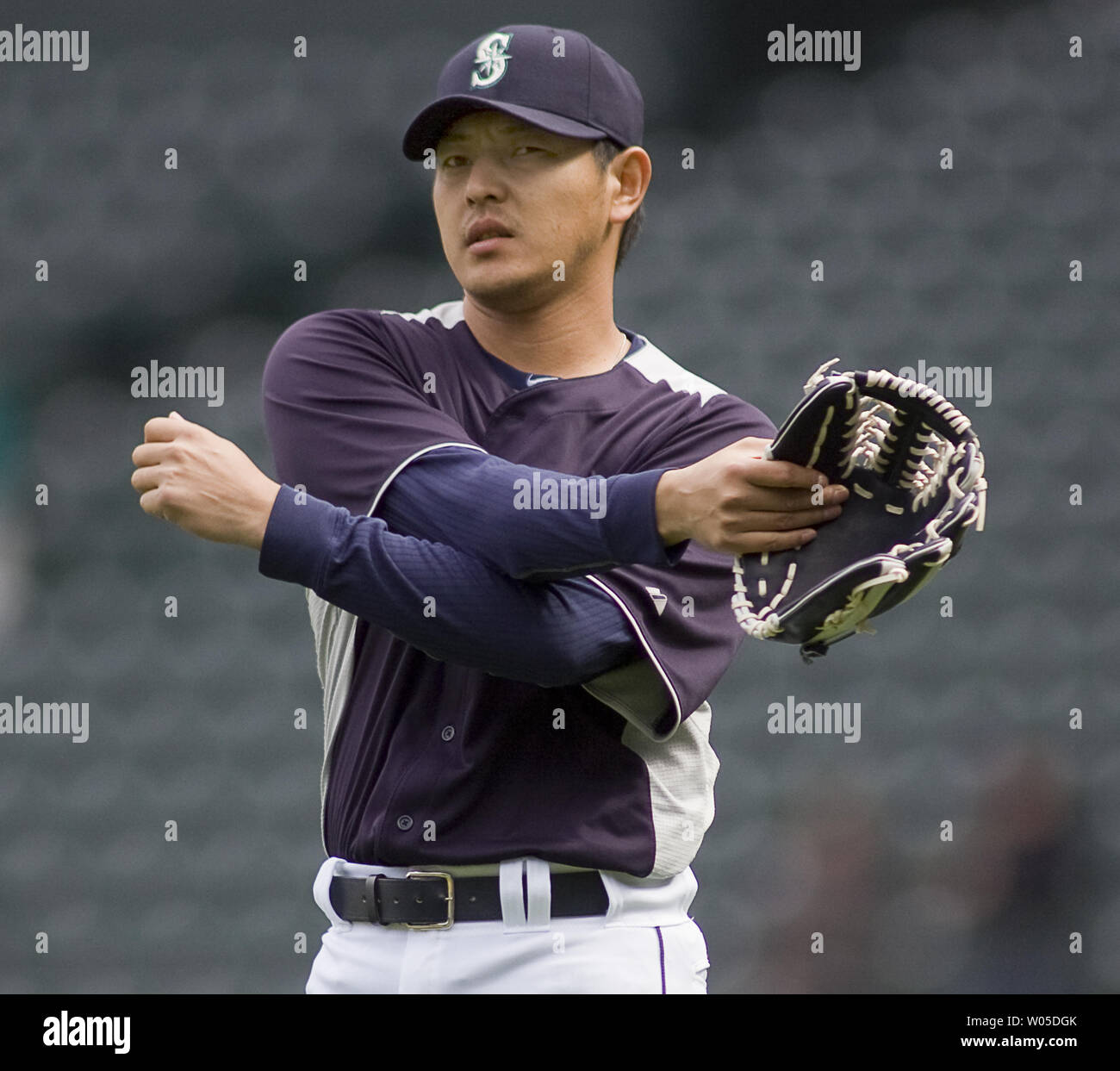 Seattle Mariners pitcher Hisashi Iwakuma stretches before their game against the Oakland Athletics  at SAFECO Field in Seattle April 15, 2012.      UPI /Jim Bryant.. Stock Photo