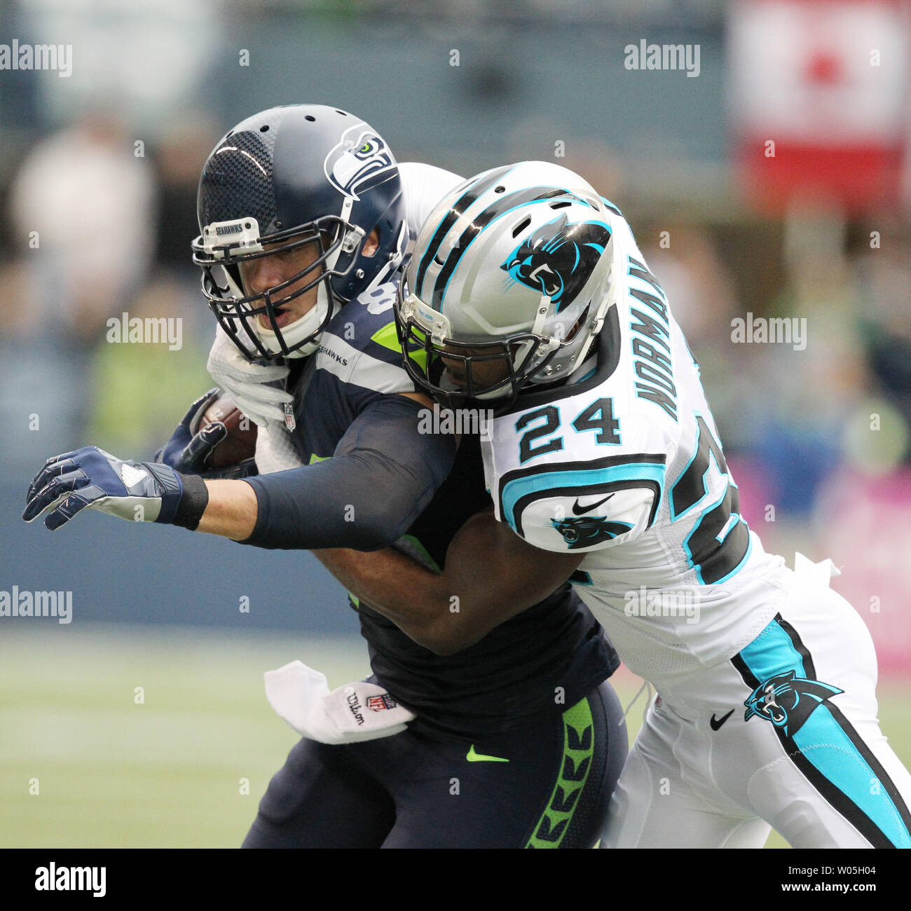 Seattle Seahawks tight end Jimmy Graham (88) brushes off a tackle by  Carolina Panthers outside linebacker A.J. Klein (56) at CenturyLink Field  in Seattle, Washington on December 4, 2016. Graham caught six