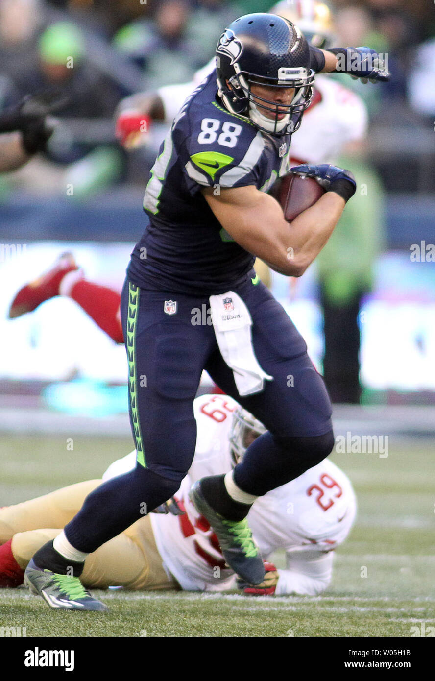 Seattle Seahawks tight end Jimmy Graham (88) brushes off a tackle