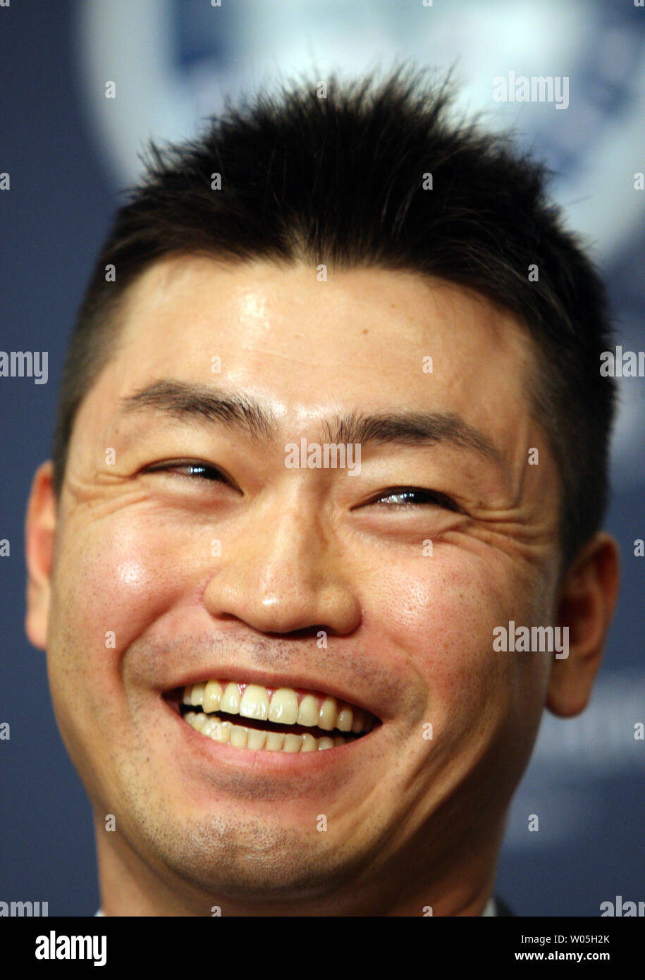 Norichika AokI smiles while being introduced to the area press. The Seattle Mariners has signed free agent outfielder Norichika AokI to a one-year contract with a vesting mutual option for the 2017 season at SAFECO Field on December 3, 2015 in Seattle.    Photo by Jim Bryant/UPI Stock Photo