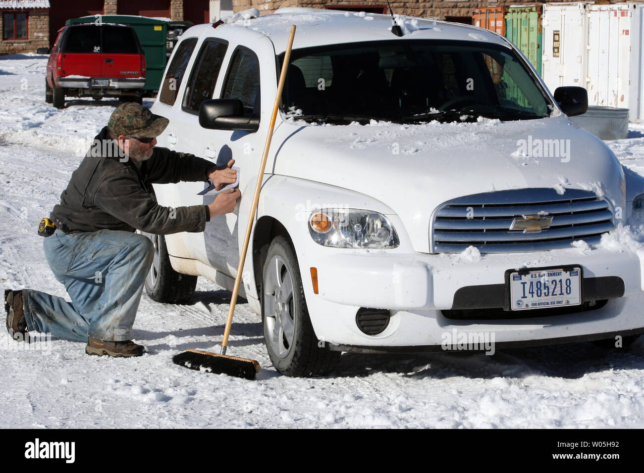 Activists Ken Medenbeck of Cresent, Oregon, changes signage on government vehicles at the Malheur National Wildlife Reserve on January 15, 2016 in Burns, Oregon.  Ammon Bundy and about 20 other protesters took over the refuge on Jan. 2 after a rally to support the imprisoned local ranchers Dwight Hammond Jr., and his son, Steven Hammond.      Photo by Jim Bryant/UPI Stock Photo