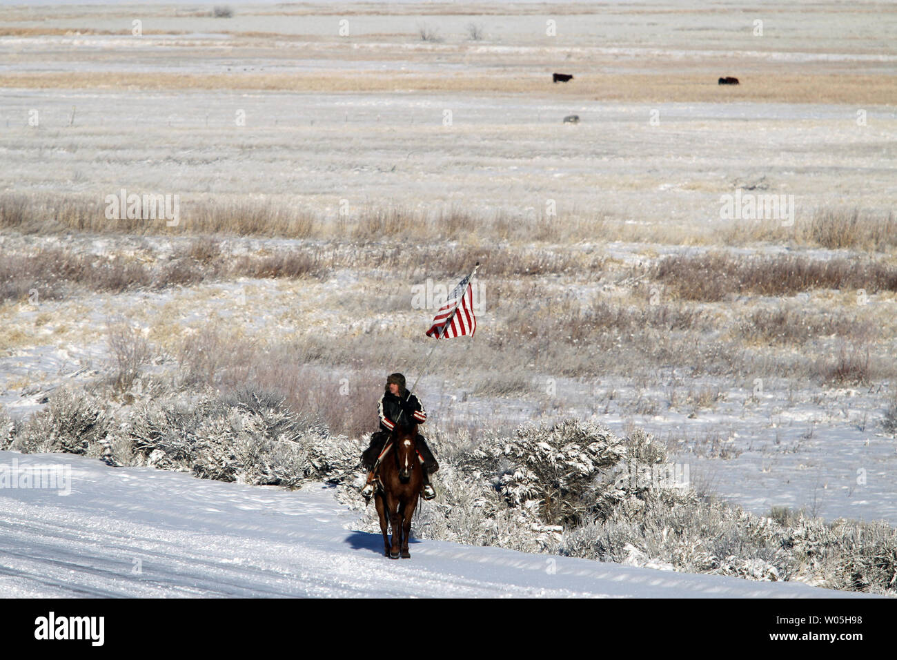 Duane Ehmer, of Irrigon, Oregon, rides the perimeter on Hellboy, at the Malheur National Wildlife Reserve on January 15, 2016 in Burns, Oregon. Ehmer has been pulling sentry duty during the takeover. Ammon Bundy and about 20 other protesters took over the refuge on Jan. 2 after a rally to support the imprisoned local ranchers Dwight Hammond Jr., and his son, Steven Hammond.      Photo by Jim Bryant/UPI Stock Photo