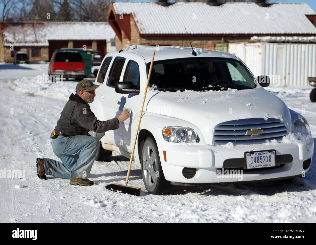 Activists Ken Medenbeck of Cresent, Oregon, changes signage on government vehicles at the Malheur National Wildlife Reserve on January 15, 2016 in Burns, Oregon.  Ammon Bundy and about 20 other protesters took over the refuge on Jan. 2 after a rally to support the imprisoned local ranchers Dwight Hammond Jr., and his son, Steven Hammond.      Photo by Jim Bryant/UPI Stock Photo