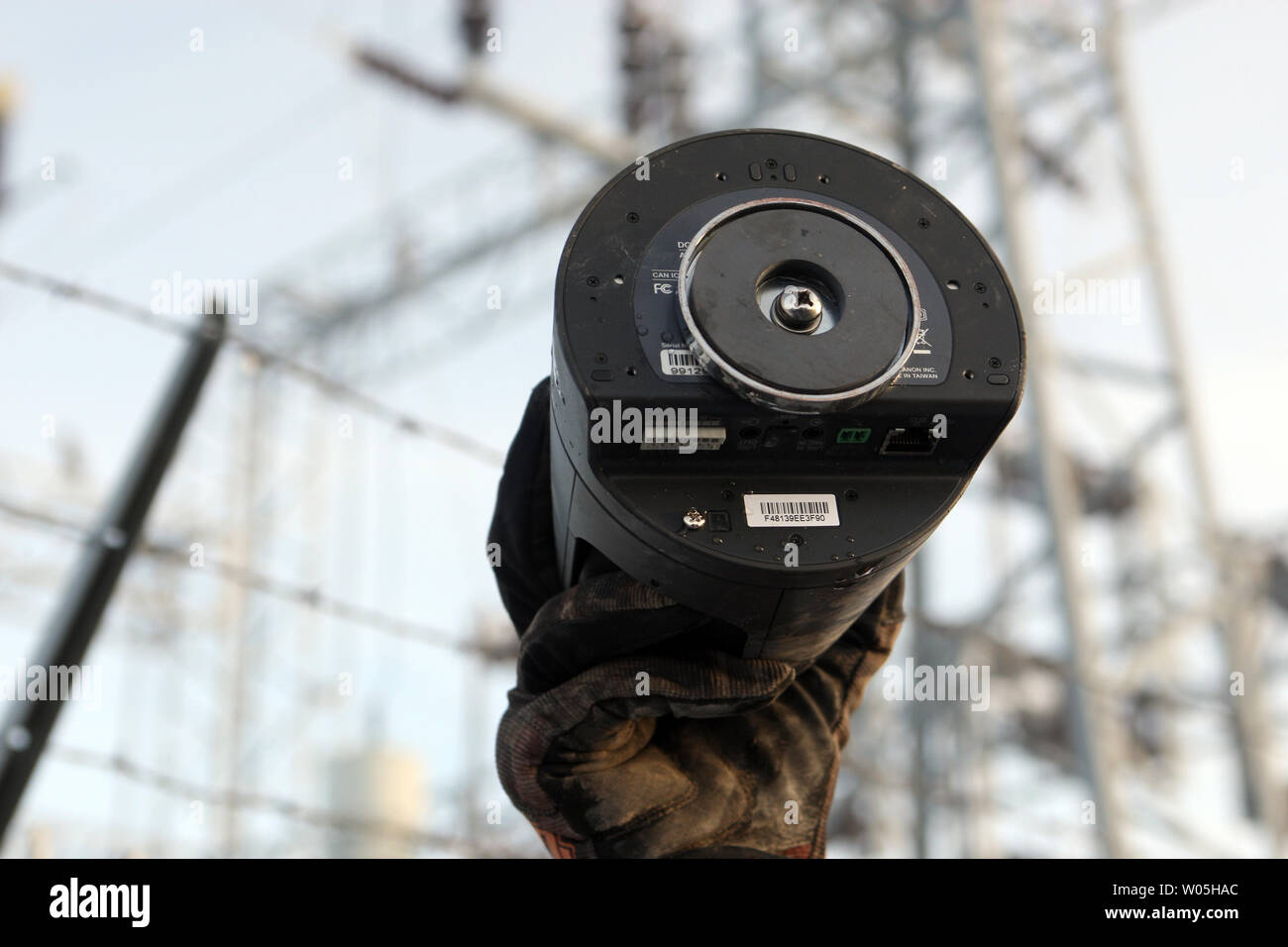 Activists Stuart Wellingham holds one of two FBI surveillance cameras found at a power station near the Malheur National Wildlife Reserve on January 15, 2016 in Burns, Oregon.  Ammon Bundy and about 20 other protesters took over the refuge on Jan. 2 after a rally to support the imprisoned local ranchers Dwight Hammond Jr., and his son, Steven Hammond. Another surveillance camera was found near the reserve.    Photo by Jim Bryant/UPI Stock Photo