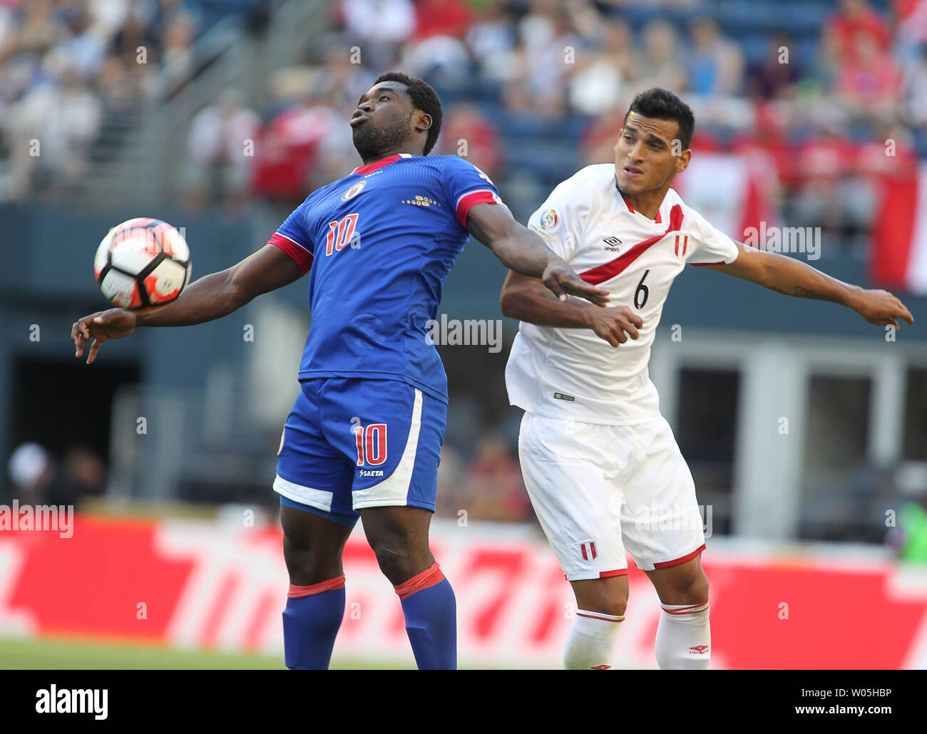 Haiti's Jeff Louis (10) keeps the ball away from Peru's Miguel Trauco (6) in a 2016 Copa America Centenario soccer match at CenturyLink Field in Seattle, Washington on June 4, 2016.  Peru beat Haiti - 1-0. Photo by Jim Bryant/ UPI Stock Photo