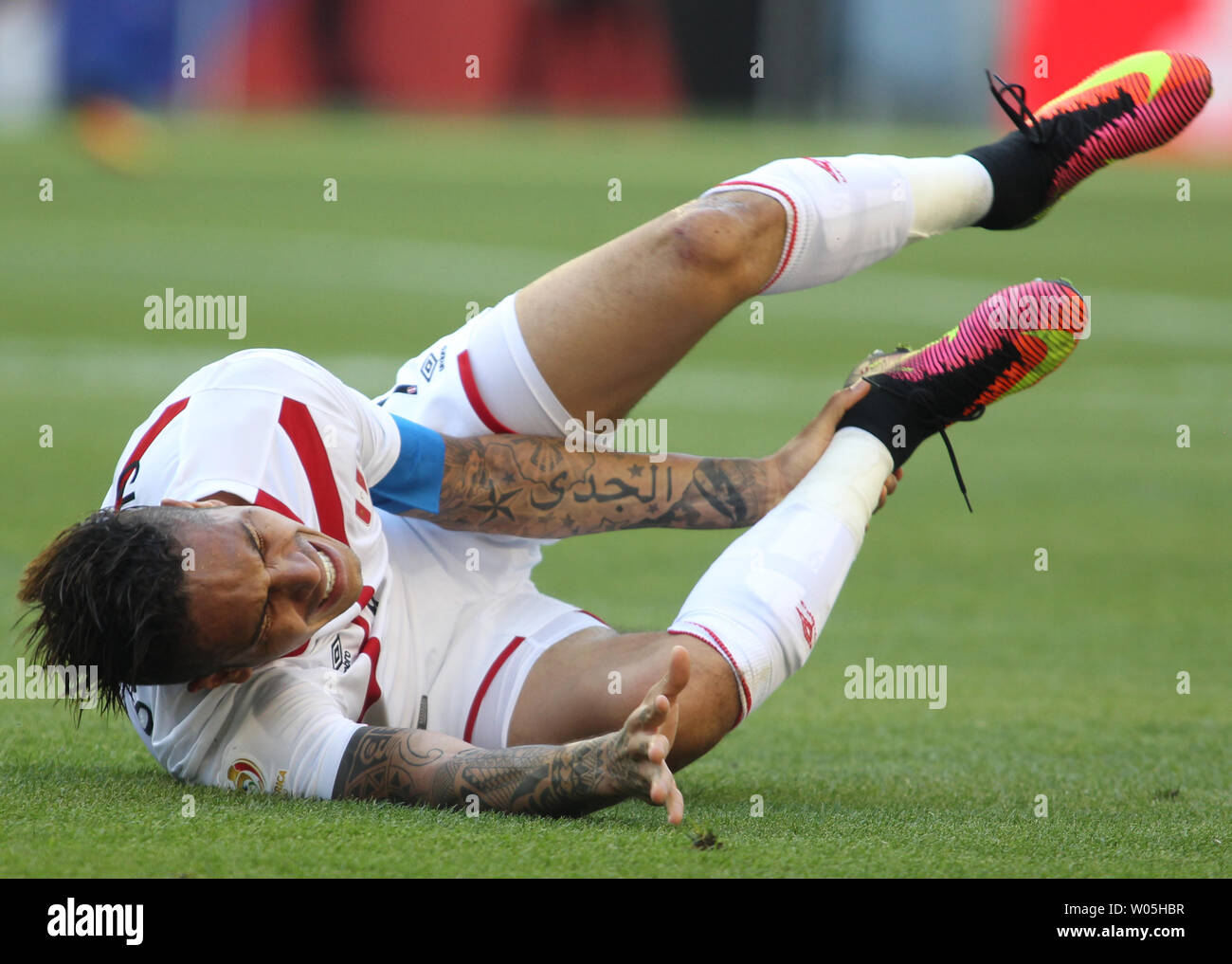 Peru's Paolo Guerrero holds in ankle after being kicked by a Haiti defender in a 2016 Copa America Centenario soccer match at CenturyLink Field in Seattle, Washington on June 4, 2016.  Peru's Guerrero scored the only goal in the 1-0 win over Hait1- 1-0. Photo by Jim Bryant/ UPI Stock Photo