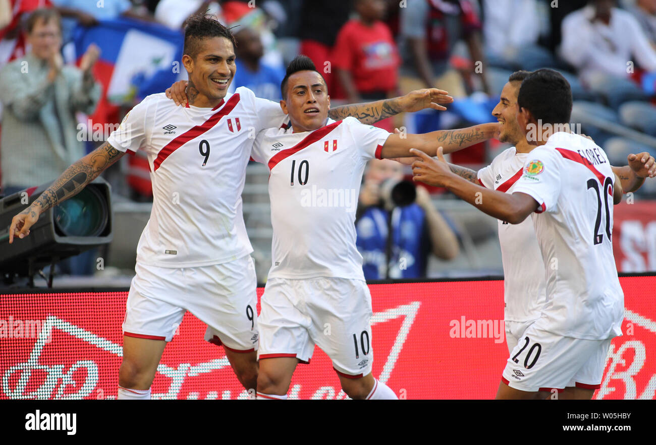 Peru's Paolo Guerrero (9) celebrates with teammates Christian Cueva (10), Yoshimar Yotun (19) and Edison Flores (20) after scoring a goal during the second half against Haiti in a 2016 Copa America Centenario soccer match at CenturyLink Field in Seattle, Washington on June 4, 2016.  Peru beat Haiti- 1-0. Photo by Jim Bryant/ UPI Stock Photo