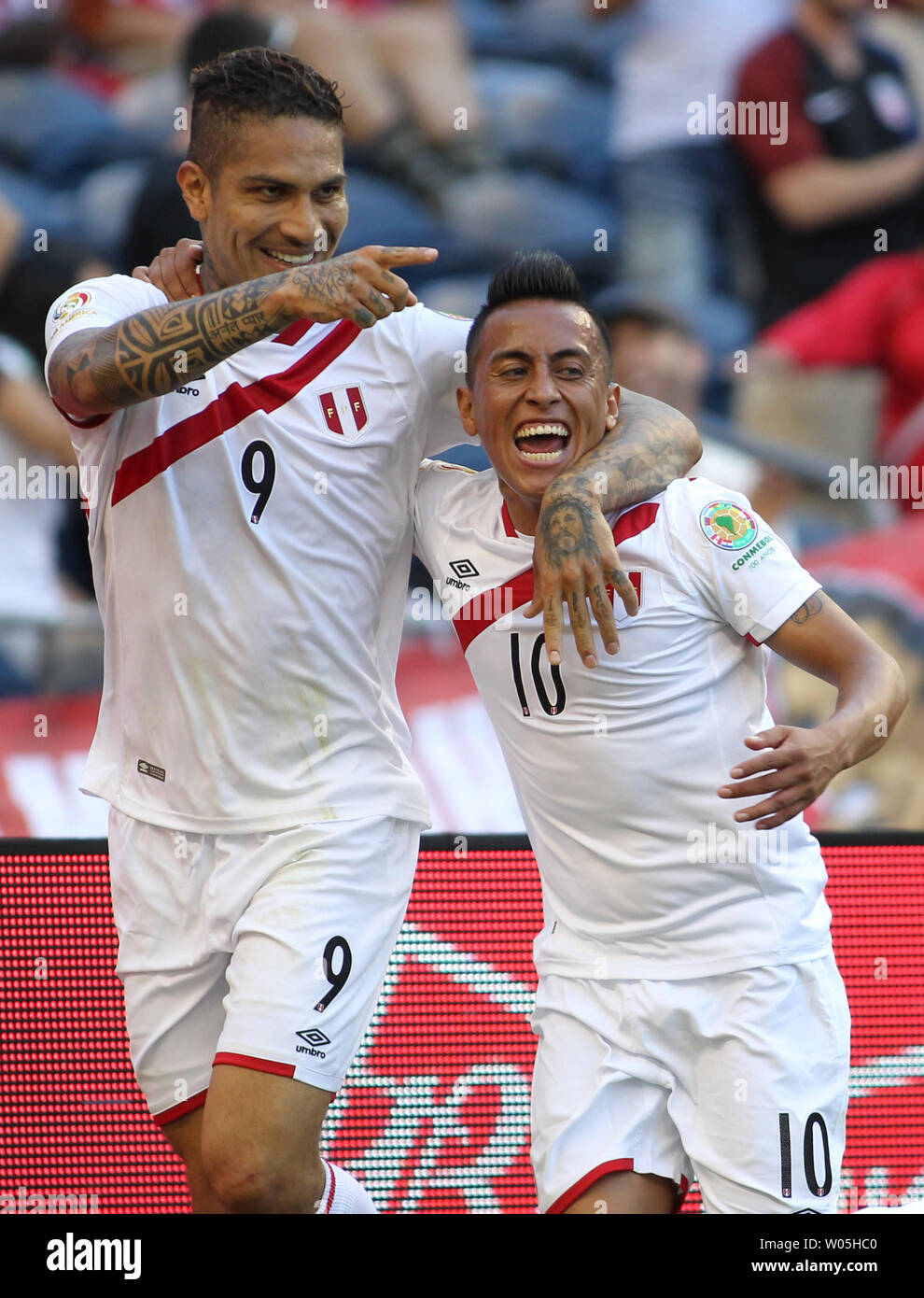 Peru's Paolo Guerrero (9) celebrates with teammate Christian Cueva (10) after scoring a goal during the second half against Haiti in a 2016 Copa America Centenario soccer match at CenturyLink Field in Seattle, Washington on June 4, 2016.  Peru beat Haiti- 1-0. Photo by Jim Bryant/ UPI Stock Photo