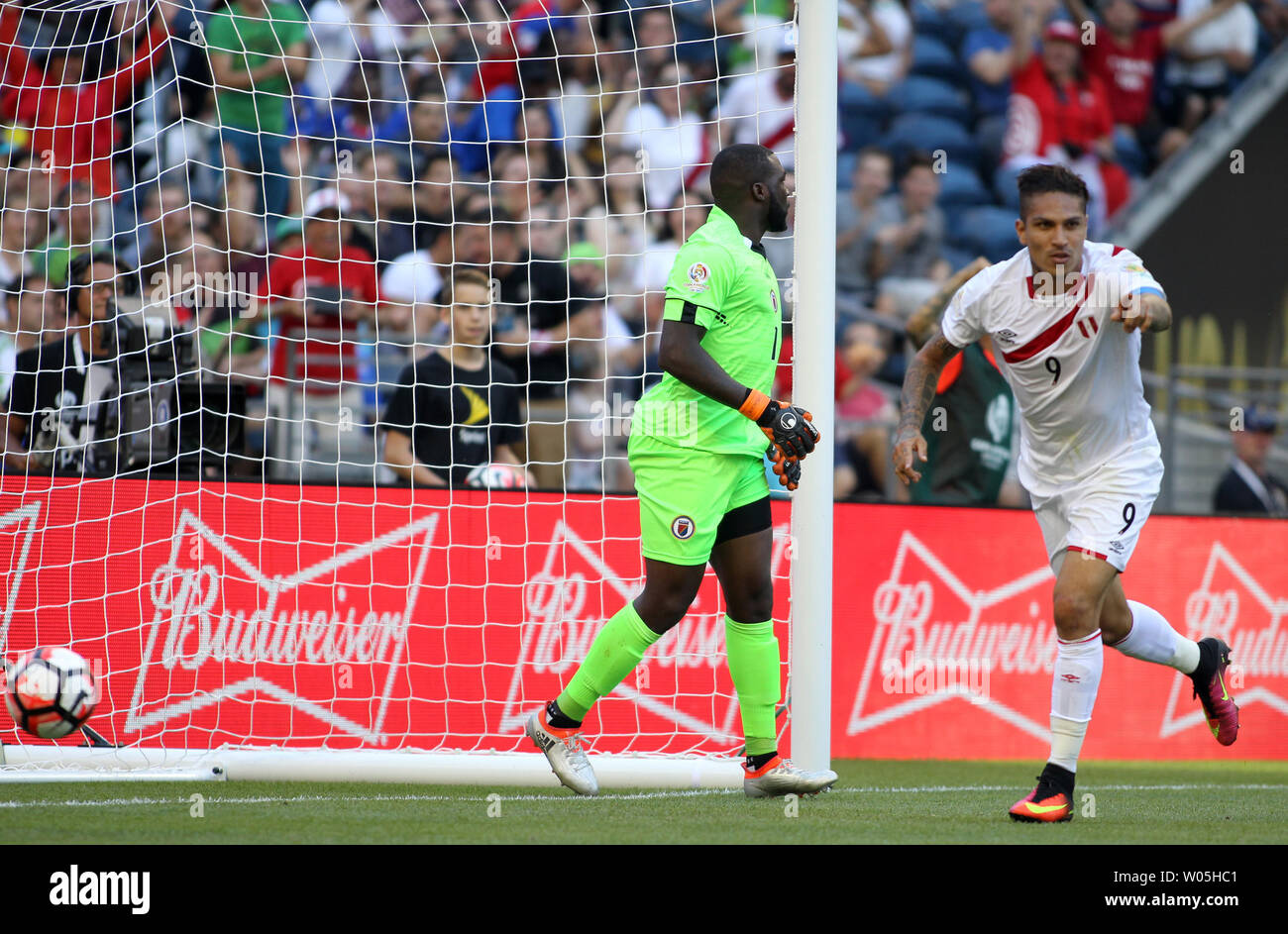 Peru's Paolo Guerrero (9) runs past Haiti's goalie Johny Placide (1) after scoring a goal during the second half in a 2016 Copa America Centenario soccer match at CenturyLink Field in Seattle, Washington on June 4, 2016.  Peru beat Haiti- 1-0. Photo by Jim Bryant/ UPI Stock Photo