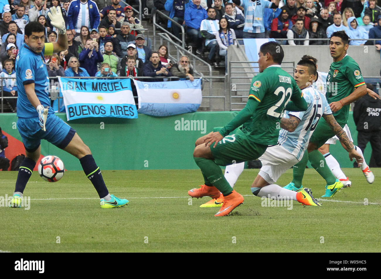 Argentina's Erik Lamela (15) boots the ball past Bolivia's goalie Carlos Lampe , left,  to score a goal in the first half in the 2016 Copa America Centenario soccer match at CenturyLink Field in Seattle, Washington on June 14, 2016.  Argentina beat Bolivia 3-0.   Photo by Jim Bryant/ UPI Stock Photo
