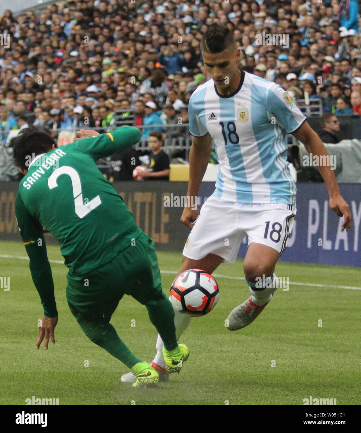 Argentina's Erik Lameia (18) kicks the ball past Bolivia's Mario Saavedra (2) in a 2016 Copa America Centenario soccer match at CenturyLink Field in Seattle, Washington on June 14, 2016.  Lameia scored a first half goal in Argentina's  3-0 win over Bolivia.   Photo by Jim Bryant/ UPI Stock Photo