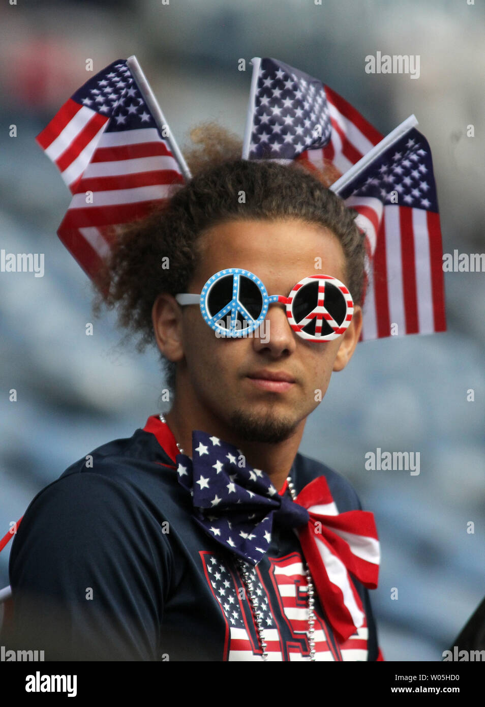 A USA fan wears flags and peace sign glasses before the game against Ecuador in a 2016 Copa America Centenario soccer quarterfinals at CenturyLink Field in Seattle, Washington on June 16, 2016.     USA beat Ecuador 2-1 to advance to the semi-finals.    Photo by Jim Bryant/ UPI Stock Photo
