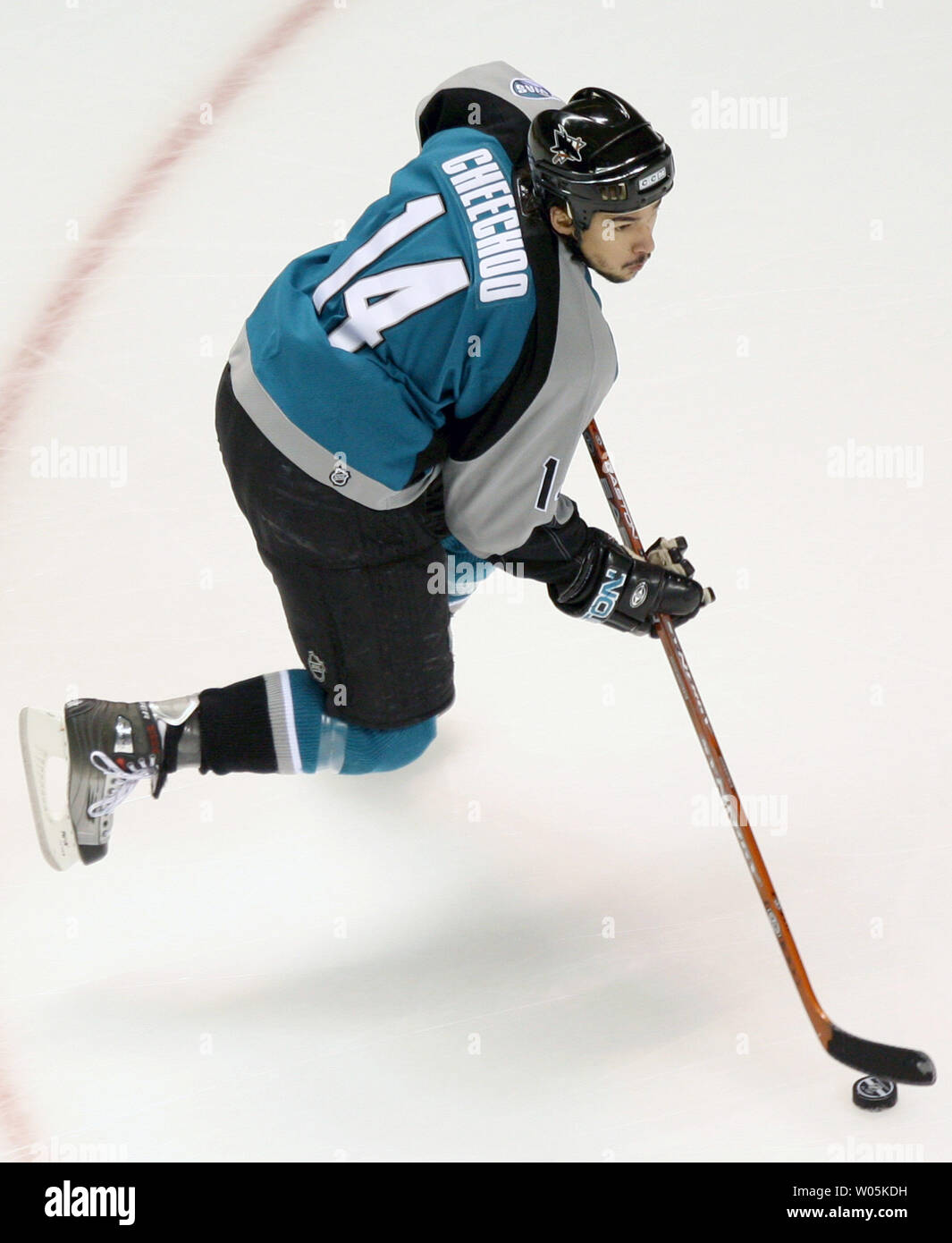 San Jose Sharks right wing Jonathan Cheechoo (14) skates towards the goal  of the Detroit Red Wings during the first period in game six of the second  round of the Stanley Cup