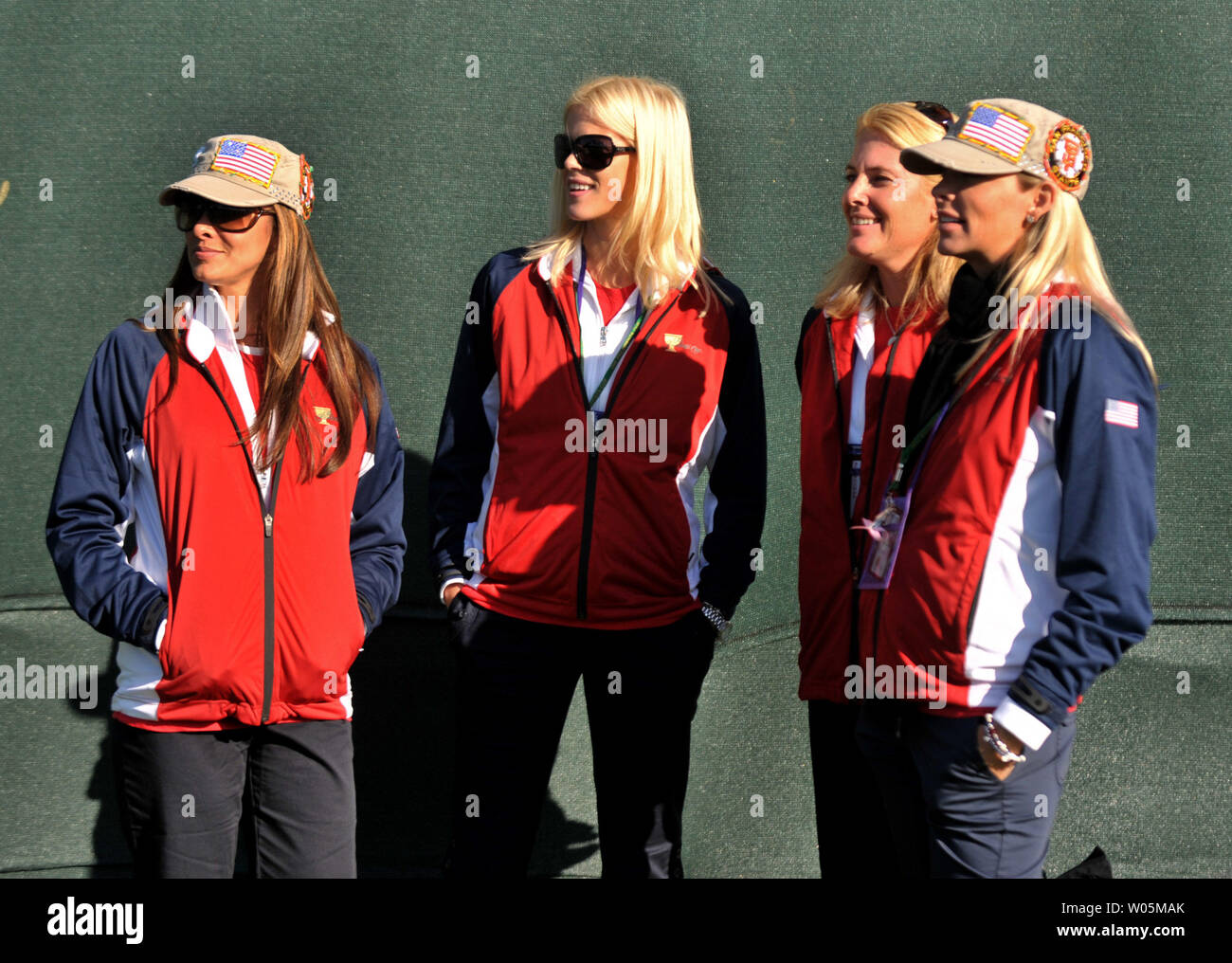 Elin Nordegren (2nd-L), the wife of United States team member Tiger Woods, is joined by other wives as she watches her husband play on the 15th green during the second round of The Presidents Cup at Harding Park Golf Course in San Francisco, California on October 9, 2009.    UPI/Kevin Dietsch Stock Photo