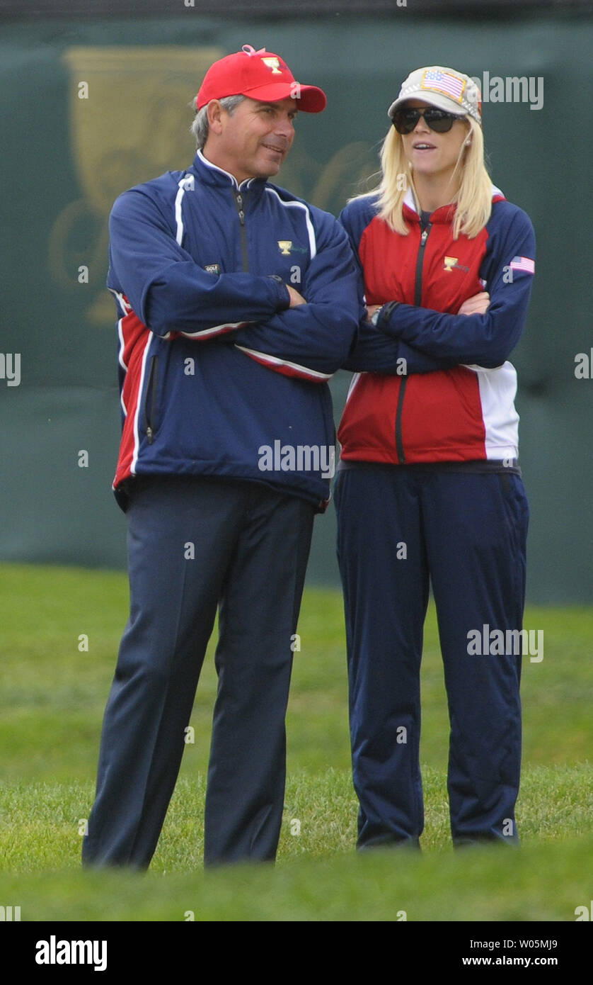 United States team captain Fred Couples talks to Tiger Woods wife Elin during the final round of the Presidents Cup at Harding Park Golf Course in San Francisco, California on October 11, 2009.    UPI/Kevin Dietsch Stock Photo