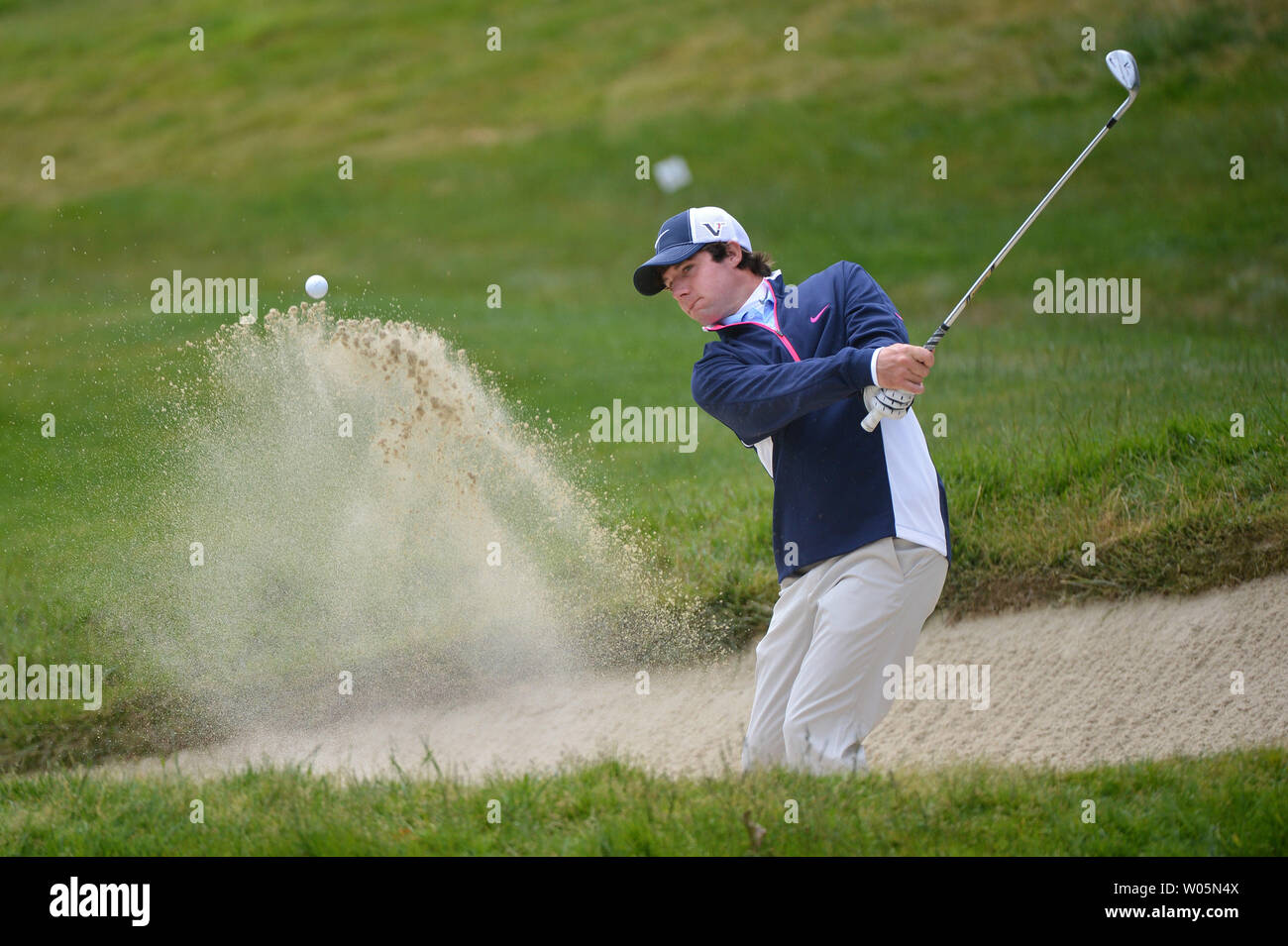 Hunter Hamrick hits out of a bunker on the 16th fairway during his practice round prior to the start of the 112th U.S. Open Championship at the Olympic Club in San Francisco, California on June 13, 2012.  UPI/Kevin Dietsch Stock Photo