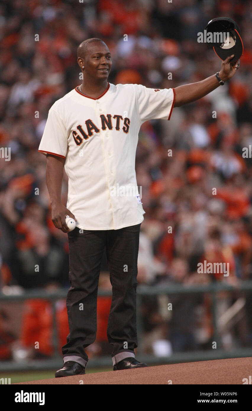 Former Giant player Victor Renteria tips his hat before throwing out the first pitch of game two of the National League Divisional Series at AT&T Park in San Francisco on October 7, 2012.   UPI/Bruce Gordon Stock Photo