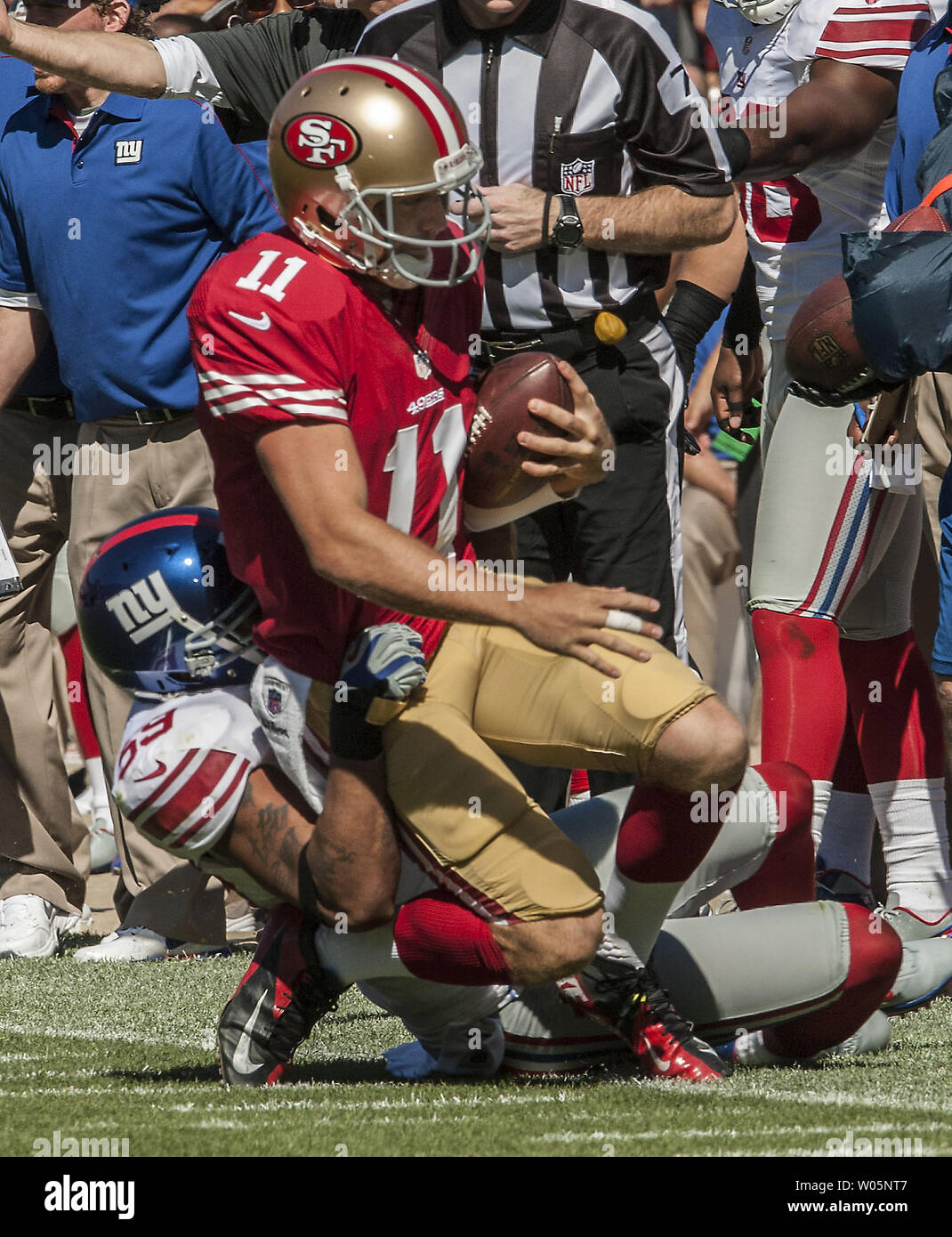 New York Giants linebacker Michael Boley (59) celebrates with safety Kenny  Phillips (21) after Phillips broke up a passing play during first half NFL  action between the New York Giants and the