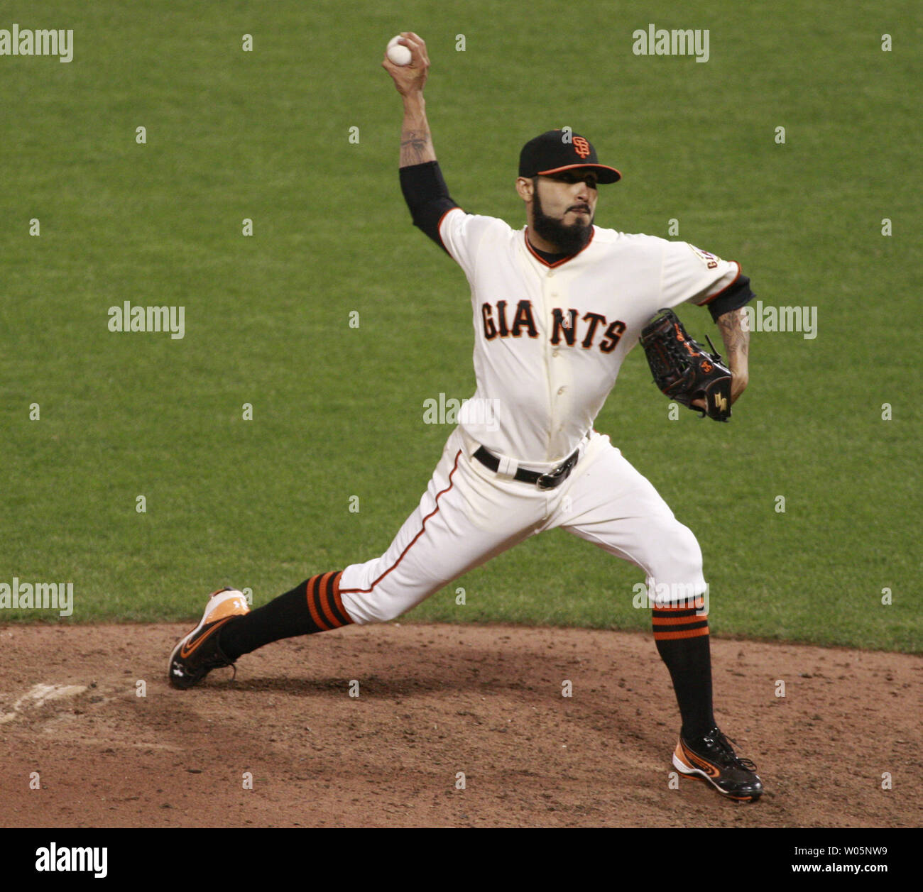 San Francisco Giants Sergio Romo throws to the St. Louis Cardinals in the ninth inning of game six of the National League Championship Series at AT&T Park in San Francisco on October 21, 2012. The Giants defeated the Cardinals 6-1 to force a game seven.   UPI/Bruce Gordon Stock Photo