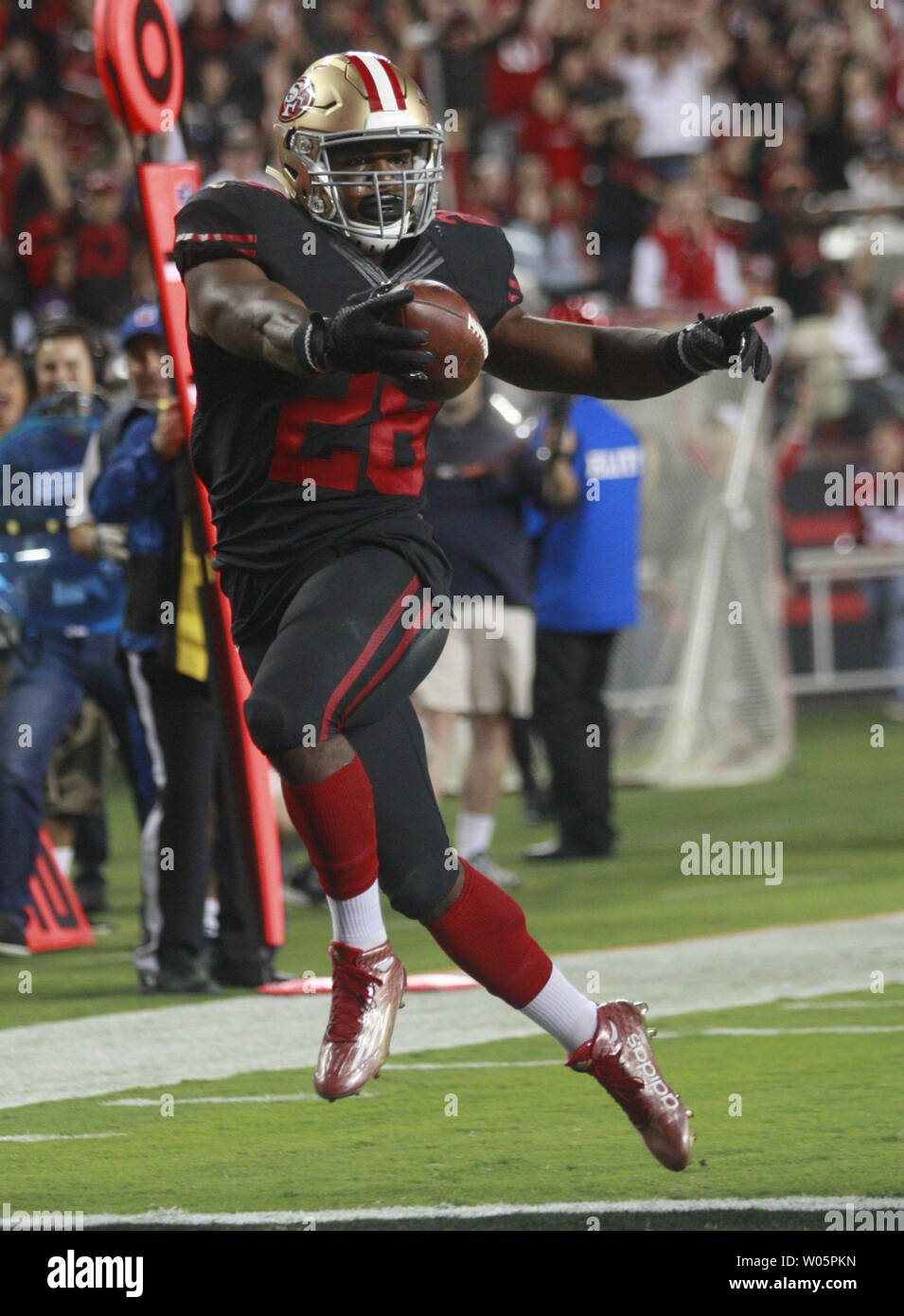 San Francisco 49ers RB Carlos Hyde (28) styles across the goal line with a 17 yard TD against the Minnesota Vikings in the fourth quarter at Levi's Stadium in Santa Clara, California on September 14, 2015. Hyde ran for 168 yards and two touchdowns in the 49ers 20-3 defeat of the Vikings.  Photo by Bruce Gordon/UPI Stock Photo
