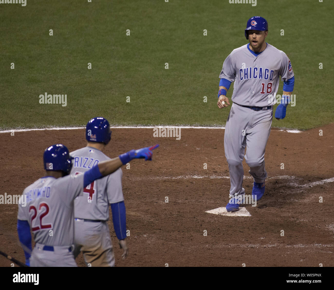 Chicago Cubs Ben Zobrist (18) yells as he crosses the plate on a base hit by Willson Contreras  tying the score in the ninth inning against the San Francisco Giants in Game 4 of the National League Division Series at AT&T Park in San Francisco on October 11, 2016. The Cubs defeated the Giants 6-5 to win the NLDS.       Photo by Bruce Gordon/UPI Stock Photo