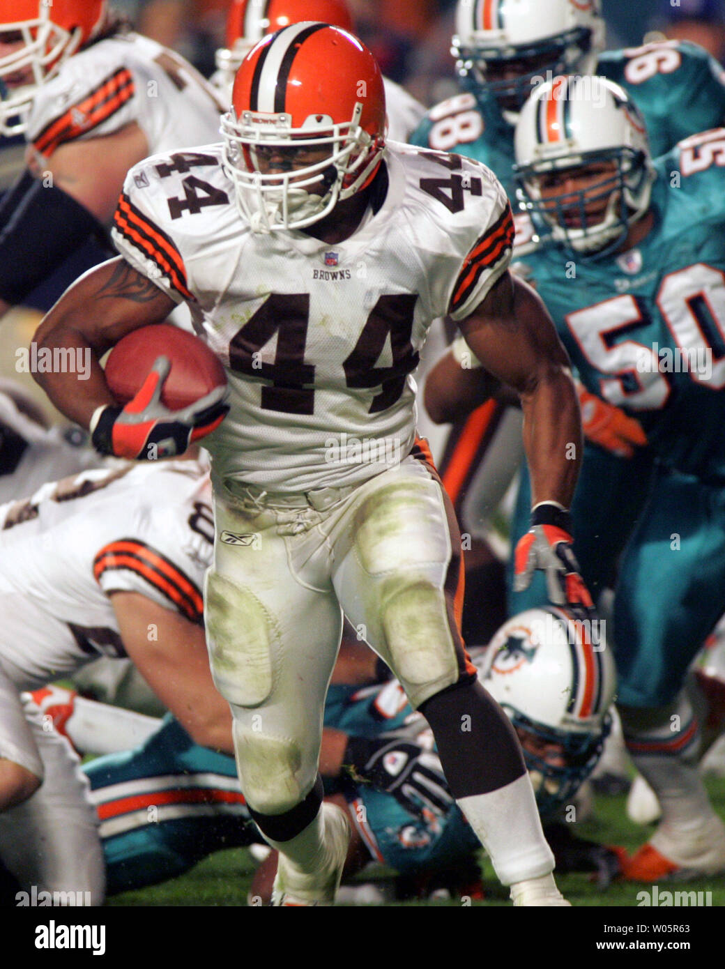 Cleveland Browns runningback Lee Suggs (44) gains yardage December 26,2004  against the Miami Dolphins at Pro Player Stadium in Miami, FL. (UPI  Photo/Susan Knowles Stock Photo - Alamy