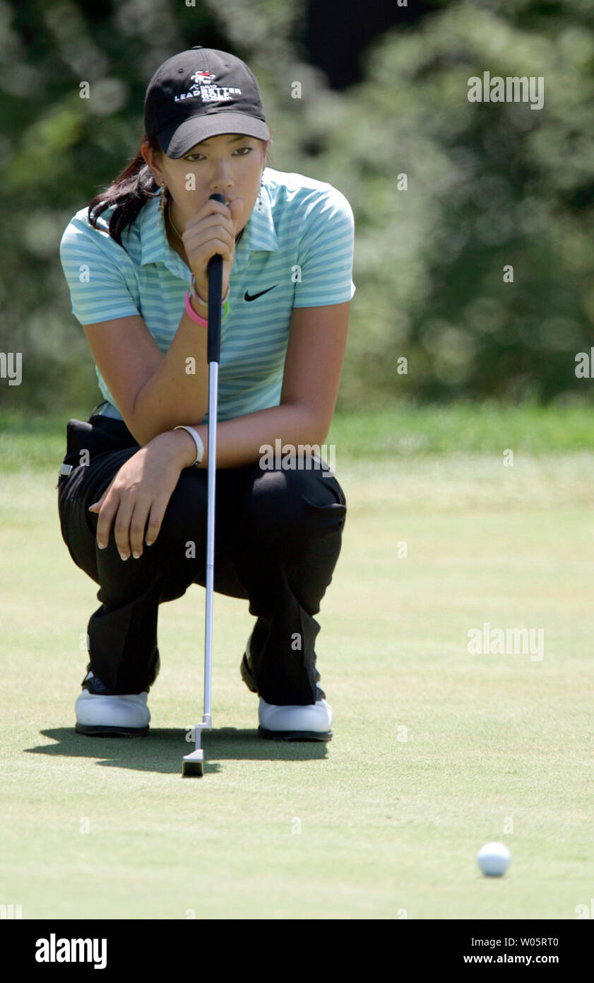 Michelle Wie lines up a putt on the 3rd green in the second round of