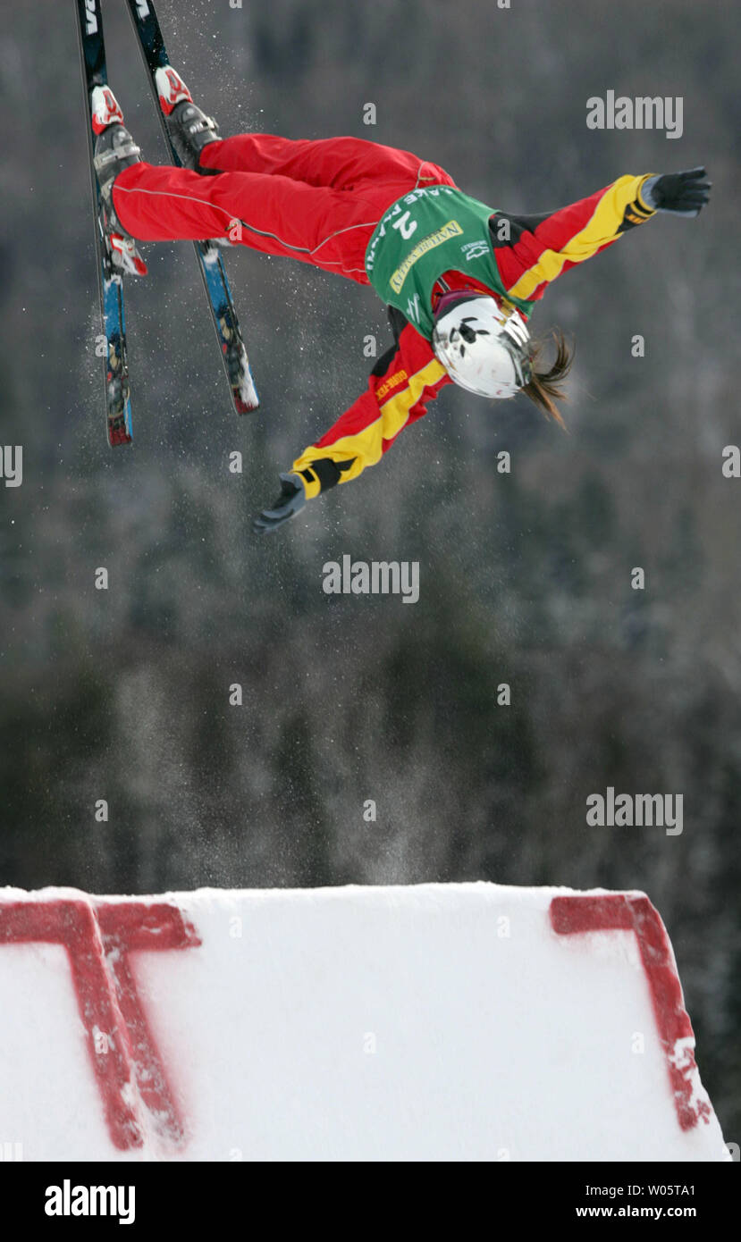 Chinese aerialist Li Nina, 22, launches into a triple-twisting double somersault en route to winning the Freestyle World Cup event in Lake Placid, NY on January 16, 2005.  Miss Li, who comes from Shenyang, China, totalled 186.72 points in two jumps to win over #1-ranked Lydia Ierodiaconou of Australia (186.01).  (UPI Photo/Grace Chiu) Stock Photo