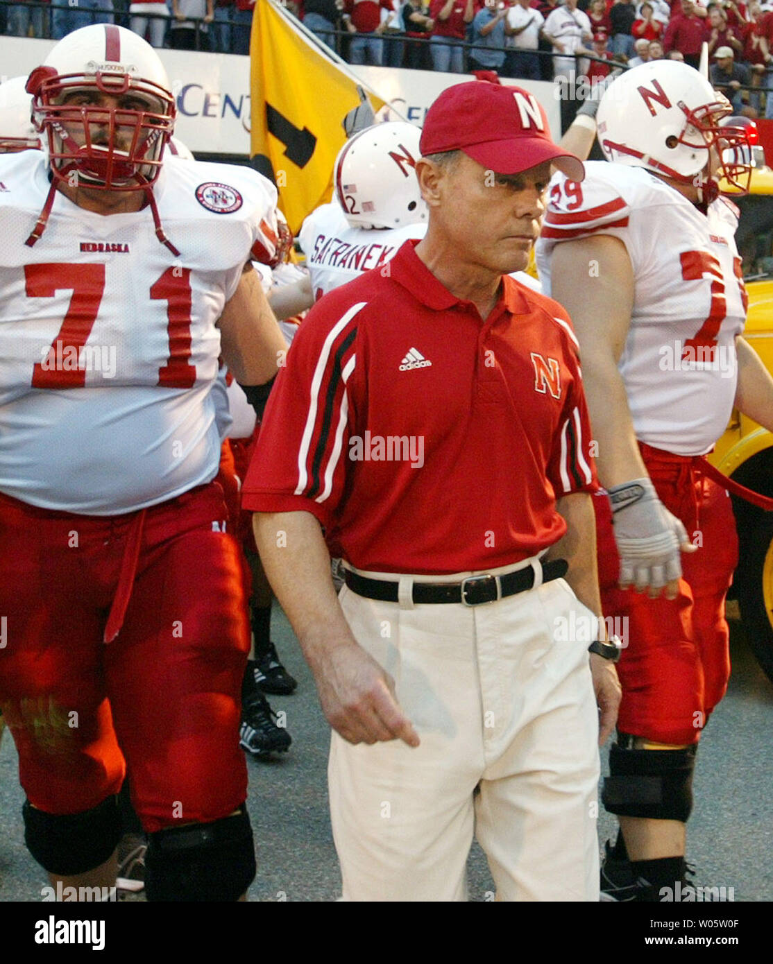 Nebraska head football coach Frank Solich leads his Cornhuskers onto Faurot  Field for a game with the Missouri Tigers in Columbia, MO on October 11,  2003. On November 30, Nebraska athletic director
