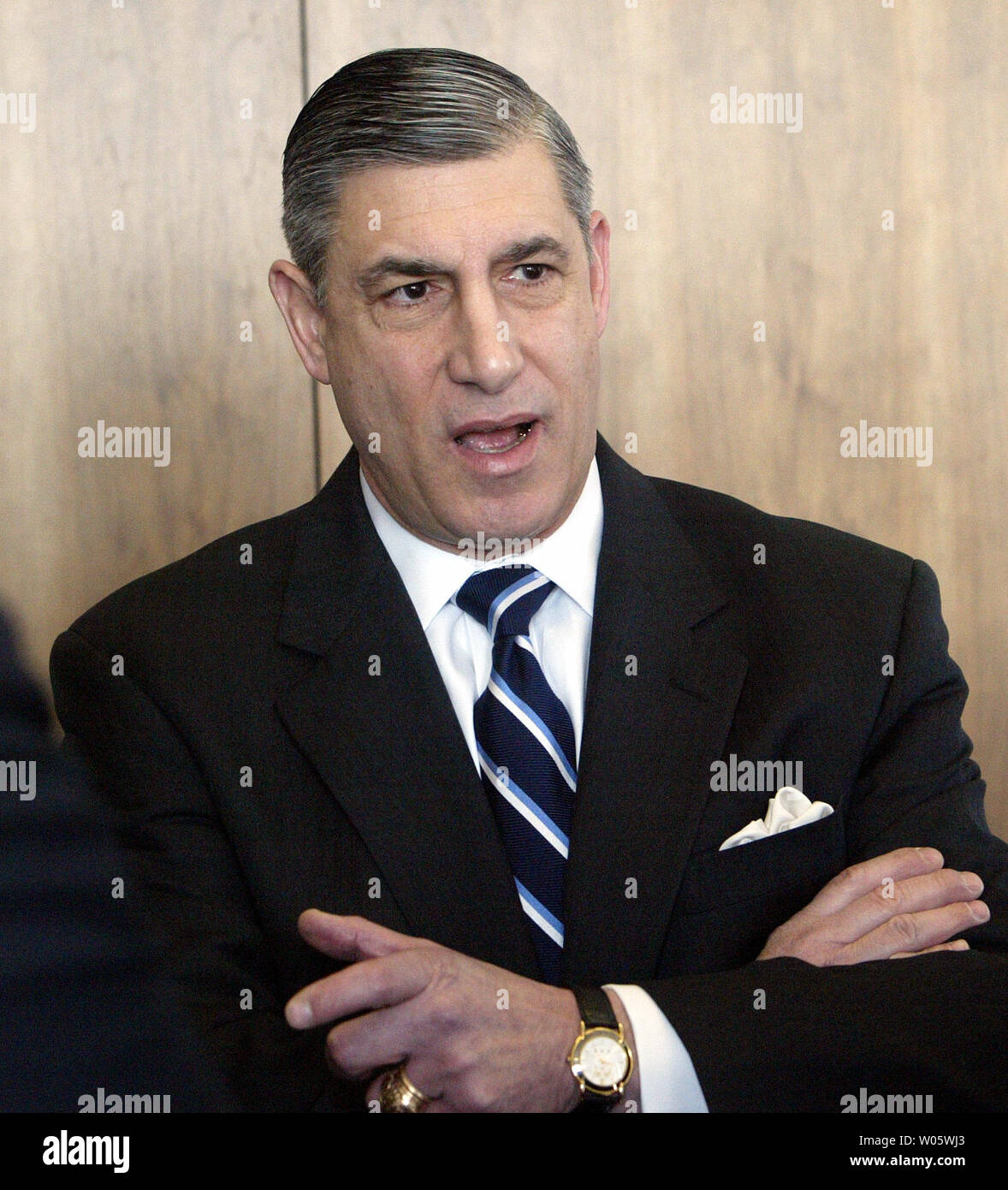 Frank Libutti, Under Secretary for Information Analysis and Infrastructure Protection for U.S. Department of Homeland Security talks to state and local officials before announcing that St. Louis is the first city outside of Washington, D.C. to receive a computer-based counterterrrorism communications system at Police Headquarters in St. Louis on February 27, 2004. This communications capability will deliver to states and major urban areas real-time interactive connectivity with the DHS Homeland Security Operations Center through the Joint Regional Informaton Exchange System (JRIES).    (UPI Ph Stock Photo