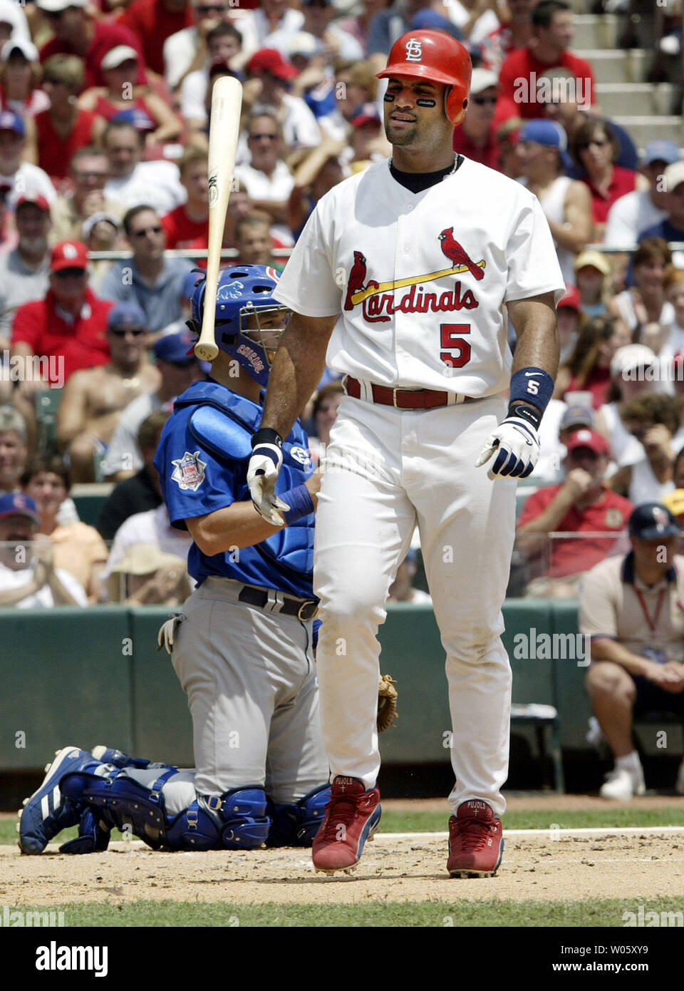 https://c8.alamy.com/comp/W05XY9/st-louis-cardinals-albert-pujols-flips-his-bat-in-disgust-after-striking-out-in-the-first-inning-against-the-chicago-cubs-at-busch-stadium-in-st-louis-on-july-10-2004-pujols-failed-to-reach-base-for-the-first-time-in-20-games-upi-photobill-greenblatt-W05XY9.jpg