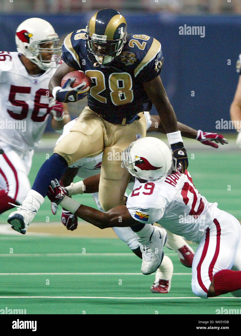 St. Louis Rams Marshall Faulk (L) congratulates Isaac Bruce after Bruce  scored a touchdown against the Seattle Seahawks in the first quarter at the  Edward Jones Dome in St. Louis on December