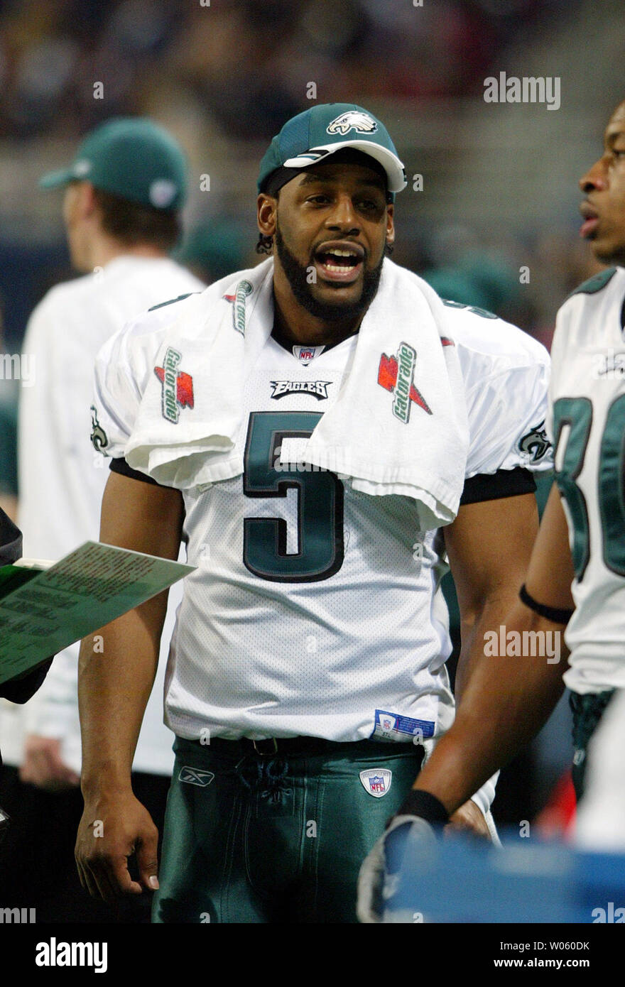 Philadelphia Eagles quarterback Donovan McNabb talks to teammates on the  sidelines during their game against the St. Louis Rams at the Edward Jones  Dome in St. Louis on December 27, 2004. McNabb