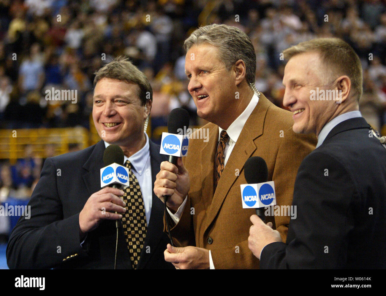 espns-broadcast-team-of-l-to-r-jeff-blatnick-dave-armstrong-and-tim-johnson-prepare-for-the-2005-ncaa-division-1-wrestling-championships-at-the-savvis-center-in-st-louis-on-march-18-2005-upi-photobill-greenblatt-W0614K.jpg