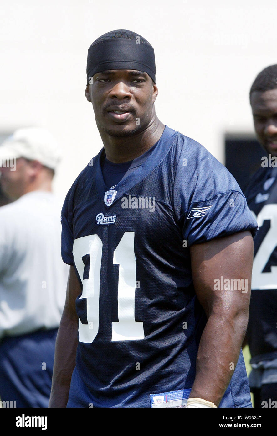 St. Louis Rams Leonard Little watches some of the activity during day two  of a mandatory mini camp at the team practice facility in Earth City, MO on  June 4, 2005. Little