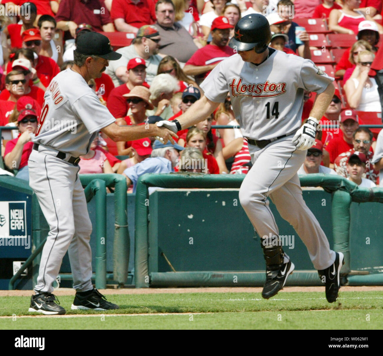 Houston Astros third base coach Doug Mansolino awaits the start of