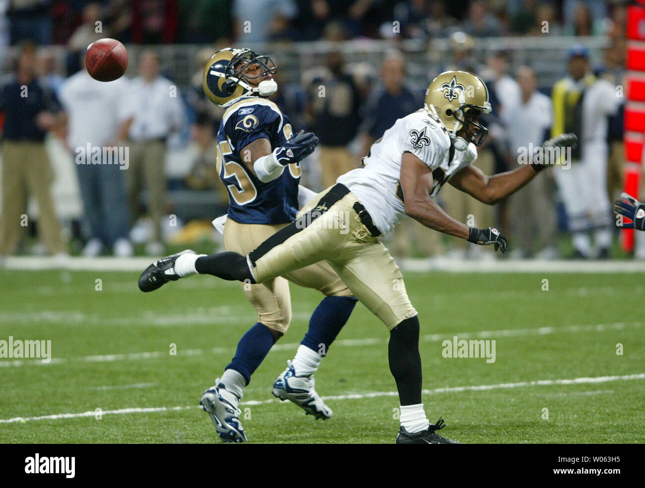 St. Louis Rams Corey Ivy (L) knocks the football away from New Orleans ...