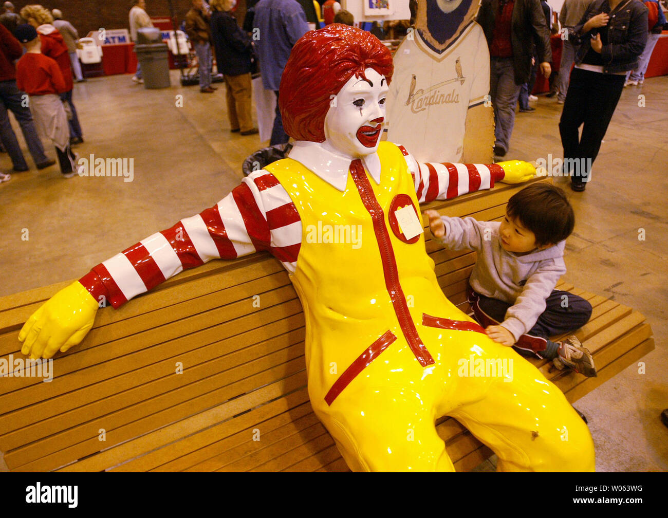 Little Two Year Old Gregory Chew Tries To Get The Attention Of The