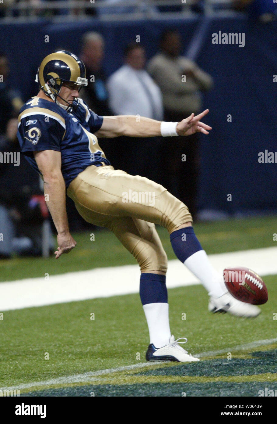 St. Louis Rams punter Bryan Barker appears to have stepped out of the endzone as he punts in the first quarter against the Washington Redskins at the Edward Jones Dome in St. Louis on December 4, 2005. The infraction went unnoticed in the 47 yard punt. (UPI Photo/Bill Greenblatt) Stock Photo