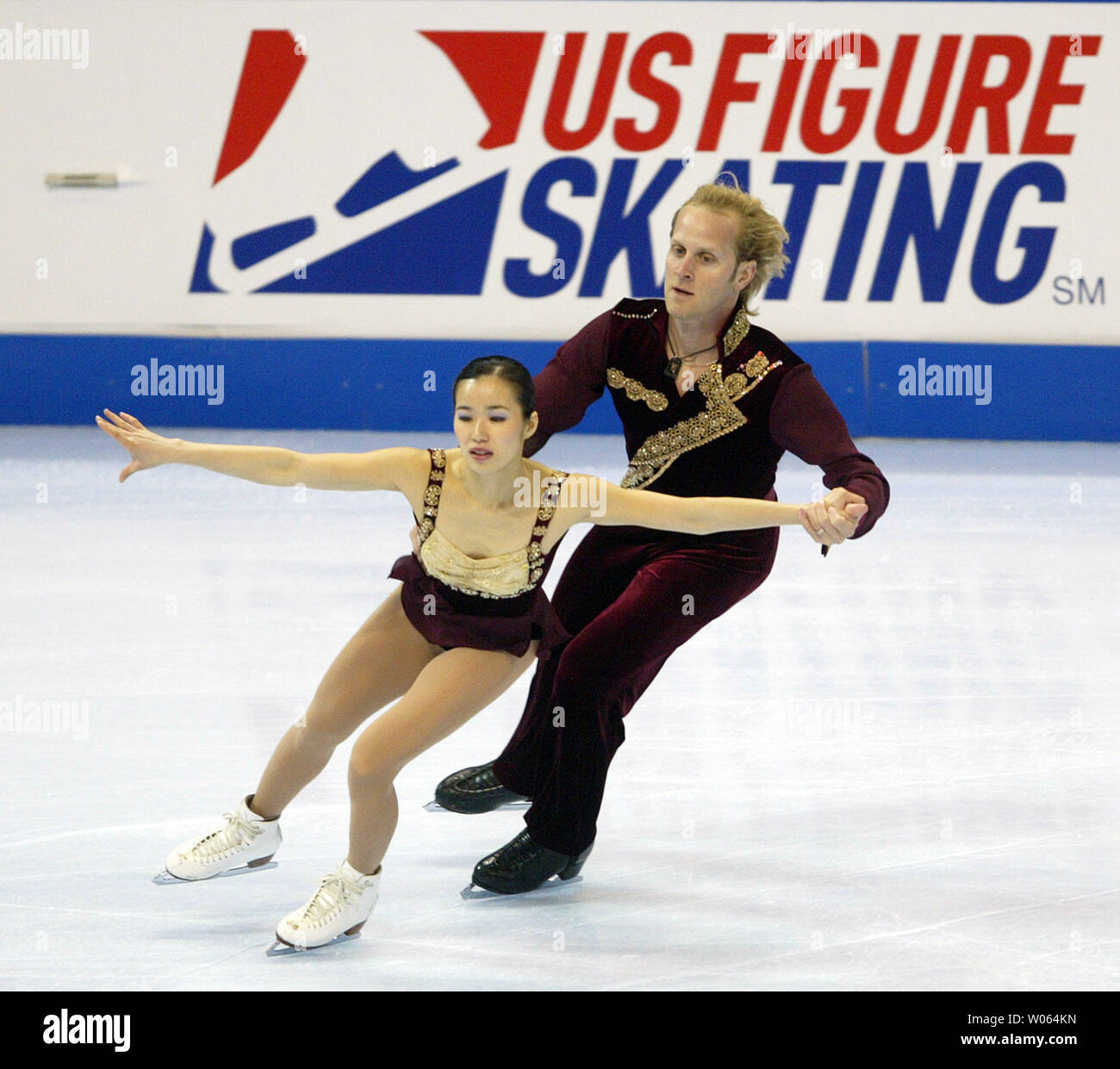 Senior dance skaters Rena Inoque of Hyougo, Japan and her partner John Baldwin of Dallas, perform their routine during the U.S. Figure Skating qualifying event at the Savvis Center in St. Louis on January 13, 2006. (UPI Photo/Bill Greenblatt) Stock Photo
