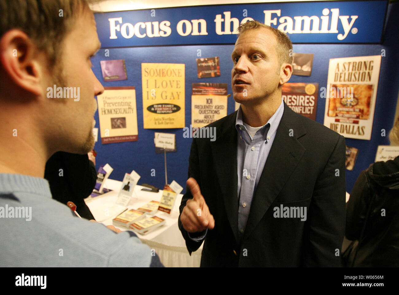 Mike Haley, Manager of Gender Issues for Focus on the Family (R) talks with Brad Allen during a break at the Love Won Out conference at the First Evangelical Church in Manchester, MO  on February 25, 2006. The one day conference preaches that homosexuality is a sin and unwanted homosexuality can be overcome. Several billboards advertising the conference have been vandalized and protesters were posted outside throughout the day. (UPI Photo/Bill Greenblatt) Stock Photo