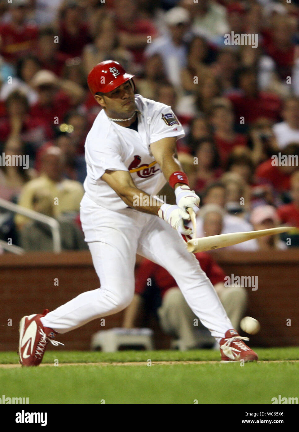 St. Louis Cardinals Albert Pujols breaks his bat as he grounds out in the  sixth inning against the Cincinnati Reds at Busch Stadium in St. Louis on  April 14, 2006. (UPI Photo/Bill