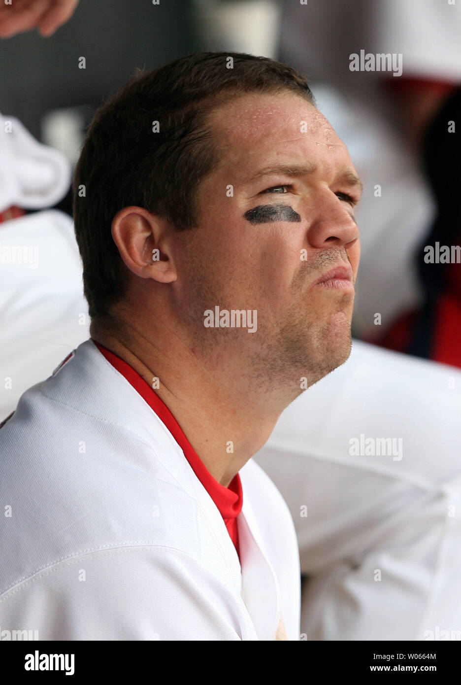 St. Louis Cardinals Scott Rolen watches the video replay board during a ...