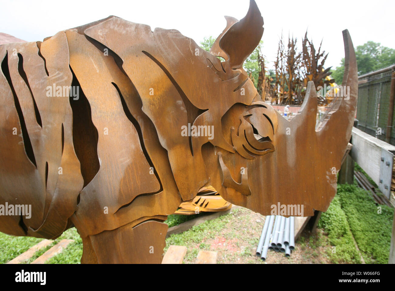 A metal rhinoceros stands waiting for installation as part of the world ...