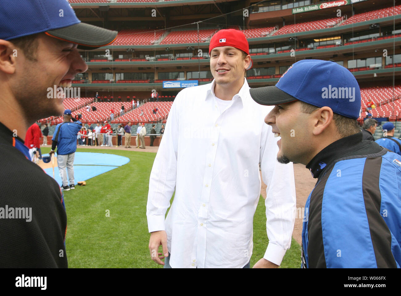 New York Mets David Wright (L) and Paul LoDuca  (R) share a laugh with friend, New York Knicks David Lee before a game with the St. Louis Cardinals at Busch Stadium in St. Louis on May 16, 2006.    (UPI Photo/Bill Greenblatt) Stock Photo