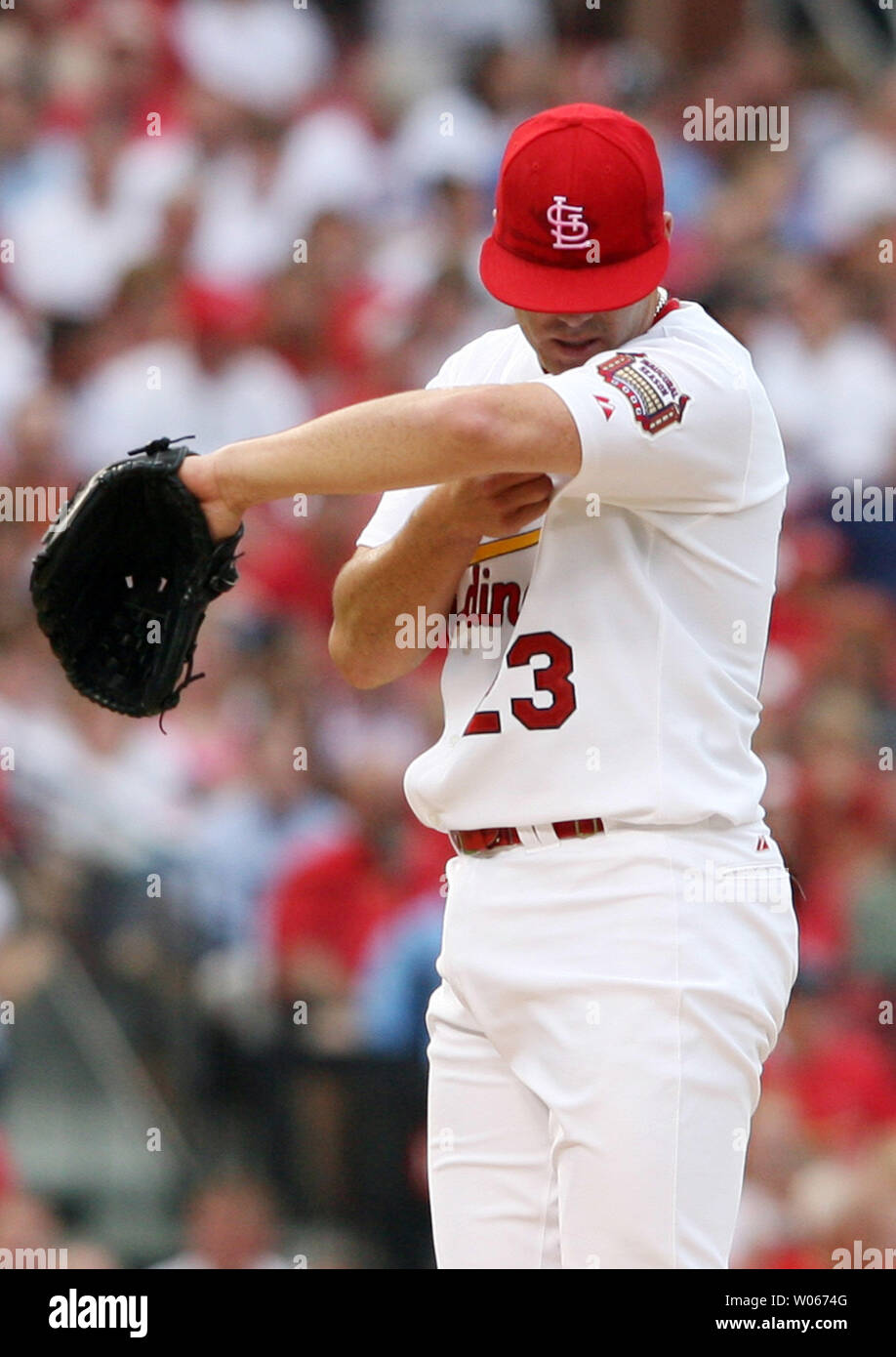 St. Louis Cardinals pitcher Anthony Reyes wipes his face after giving ...